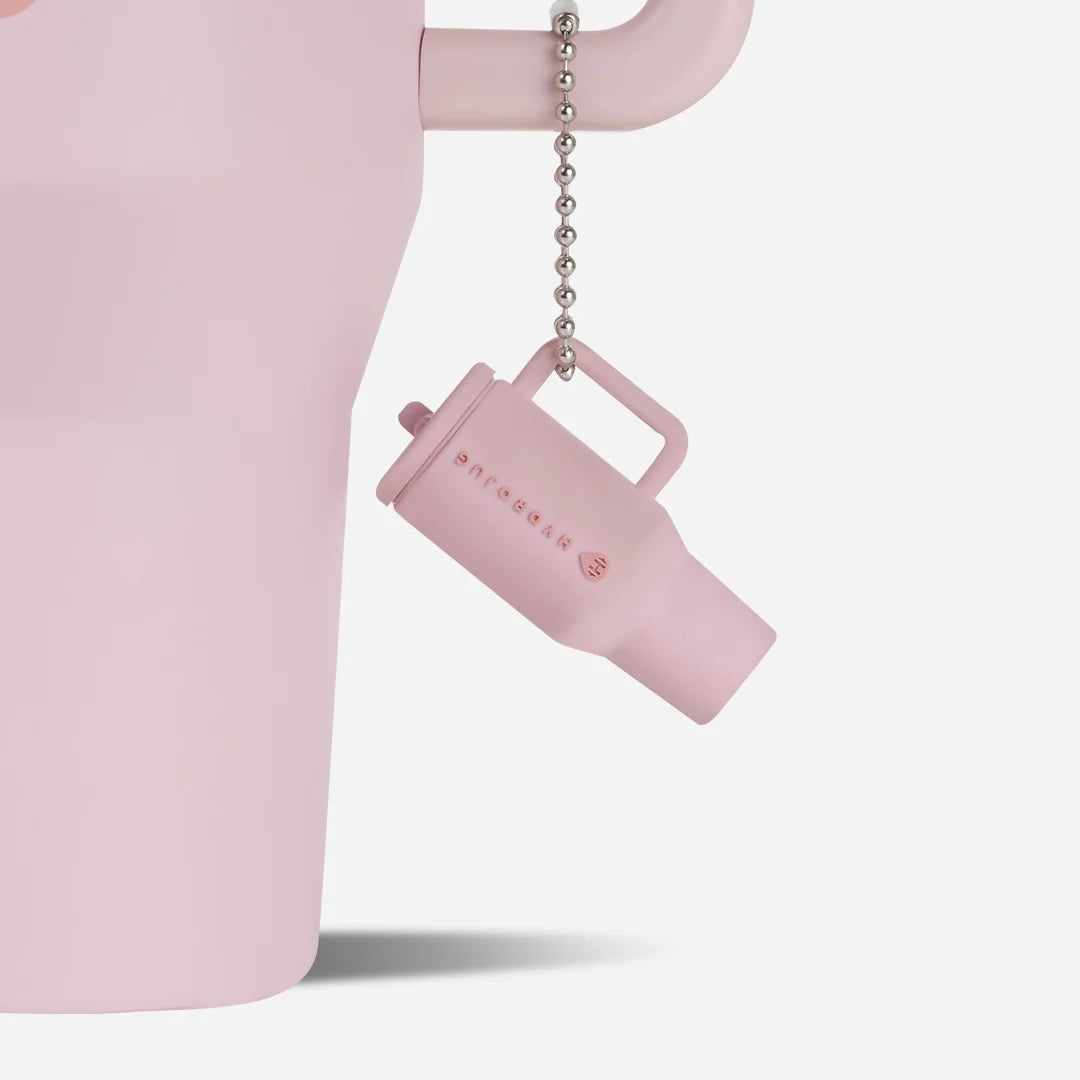 traveler-keychain-o4 Web-TravelerKeychainPhotos-PinkSand2.webp